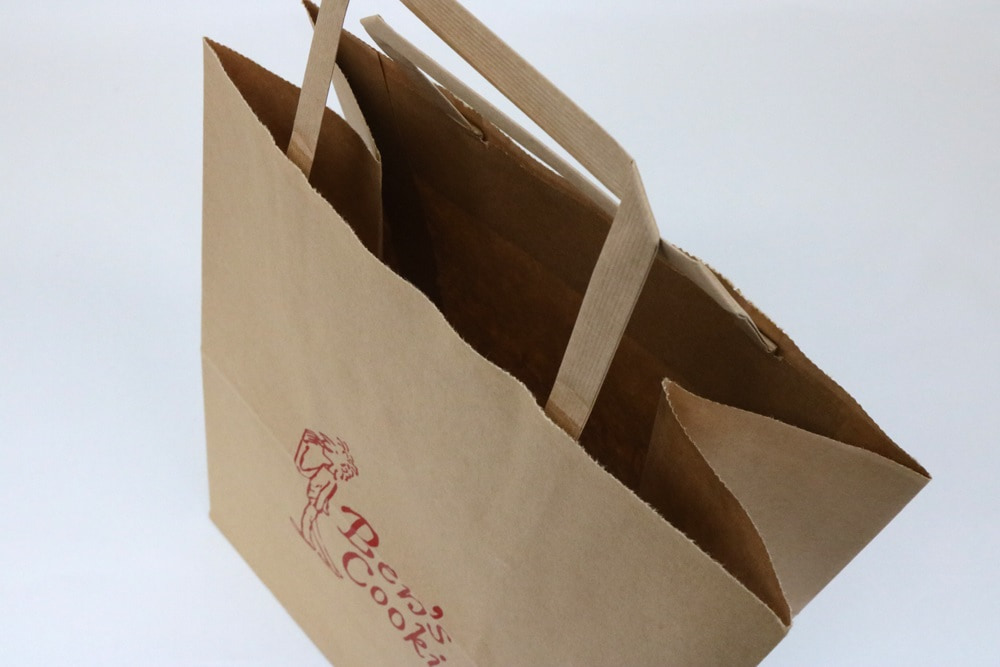 未晒クラフト（茶）表面加工なし入れ口ギザギザタイプ、フレキソ１色印刷の別注輪転紙袋の入れ口画像