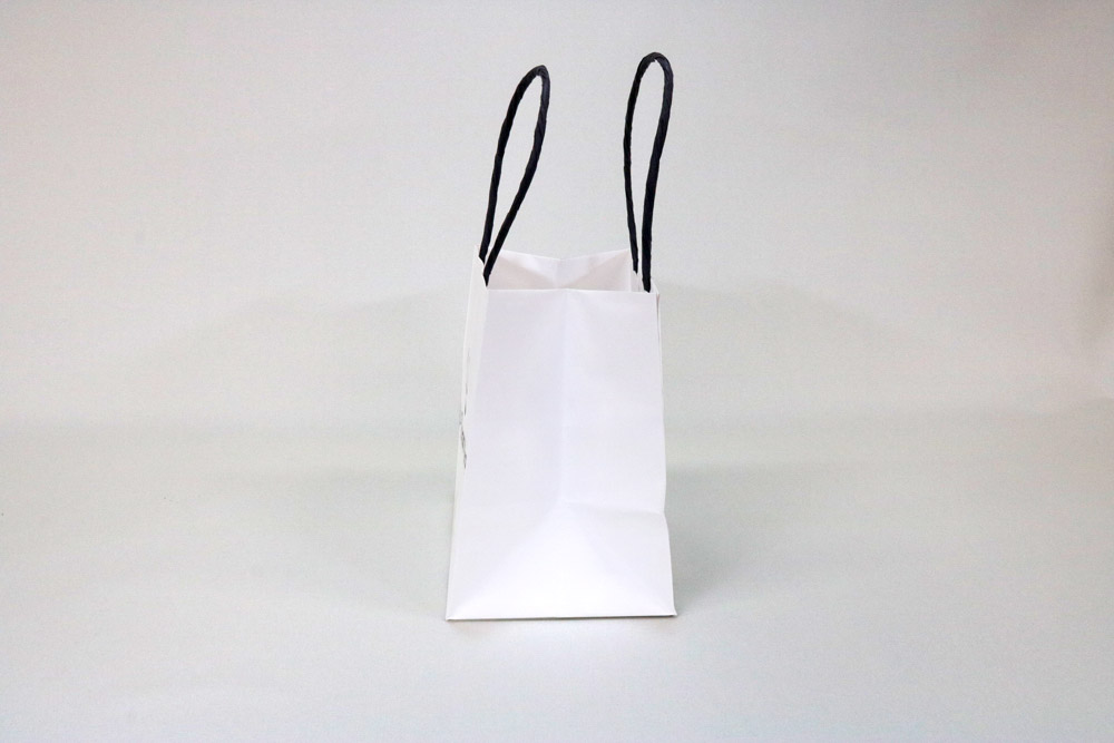 晒クラフト（白）自動手付紐、オフセット1色印刷（ベタ無し）の別注紙袋の側面画像
