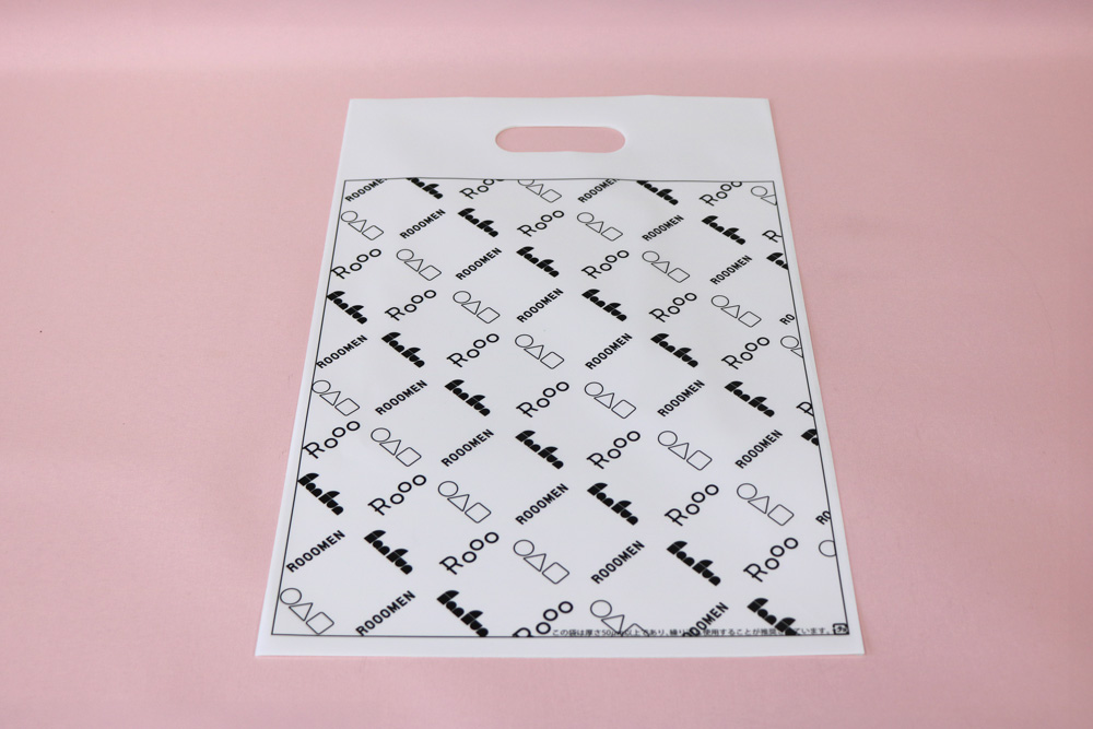 LDPE+OP(透明)0.08㎜厚のUVオフセット印刷 片面1色の小判穴抜きポリ袋の表面画像