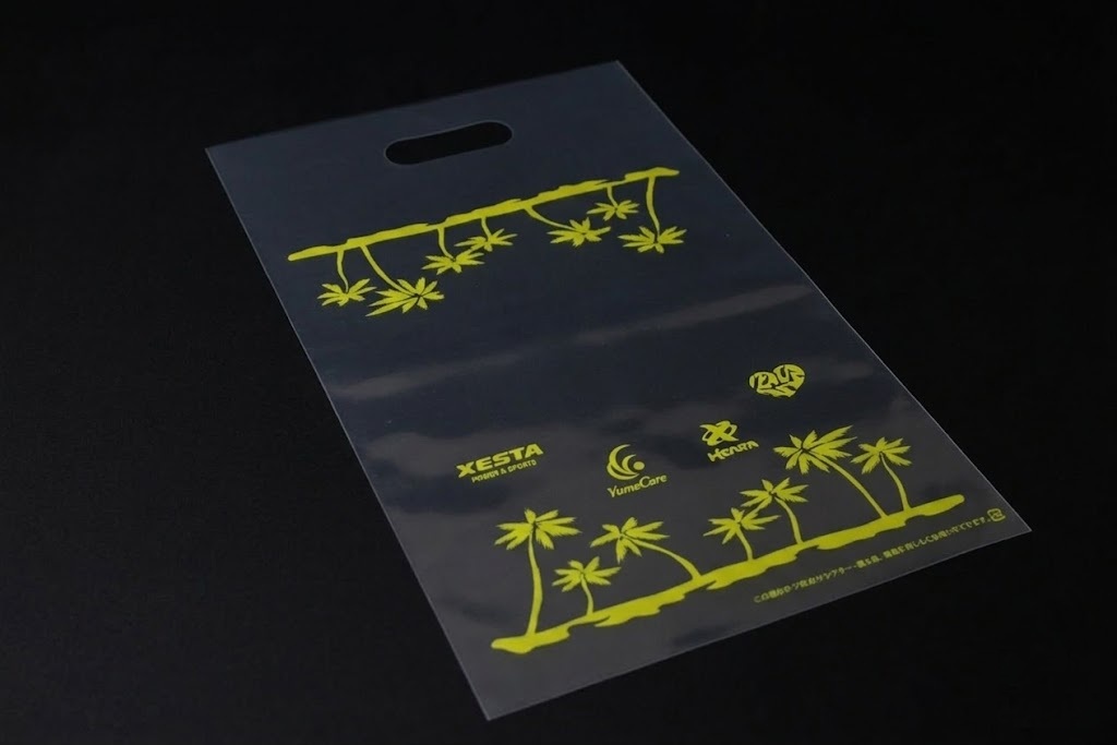 LDPE+OP 0.08㎜厚のUVオフセット印刷 片面１色の小判穴抜きポリ袋