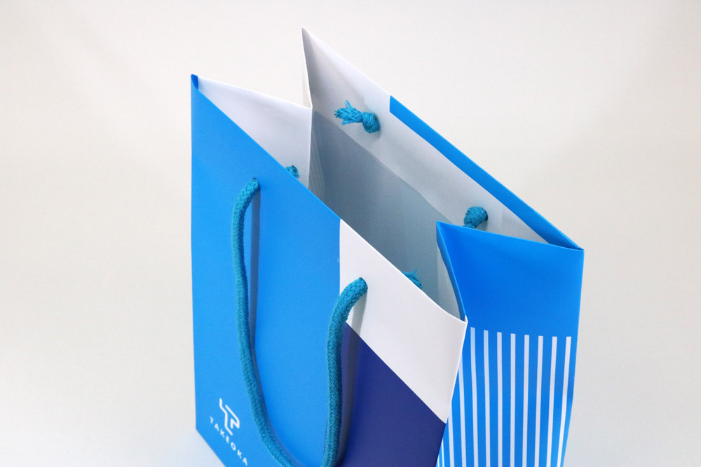 コート紙表面マットPP貼り、オフセット印刷2色の別注紙袋の入れ口画像