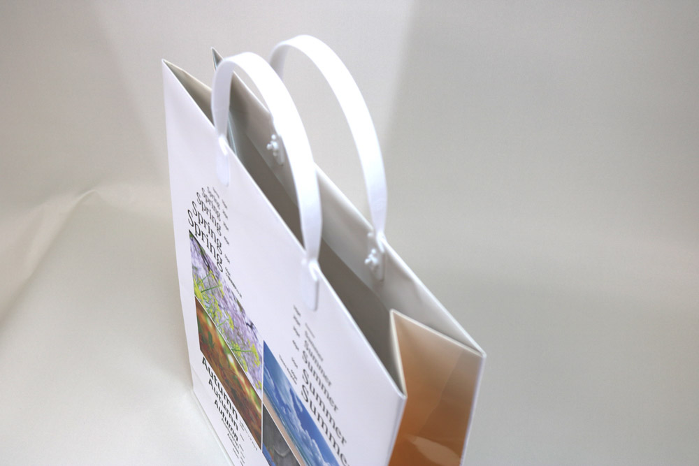 コート紙表面グロスPP貼り、オンデマンド印刷カラー4色の別注紙袋の入れ口画像