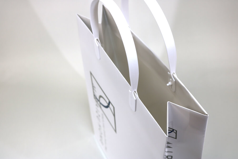 コート紙表面グロスPP貼り、オフセット印刷2色の別注紙袋の入れ口画像