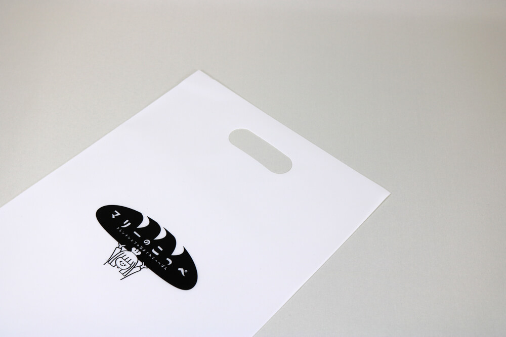 LDPE+OPのUVオフセット印刷片面１色の小判穴抜きポリ袋の入れ口画像