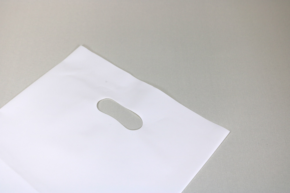 LDPEのフレキソ印刷片面１色の小判穴抜きポリ袋の入れ口画像