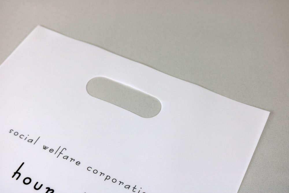 LDPE+OPのUVオフセット印刷片面４色（カラー）の小判穴抜きポリ袋の入れ口画像