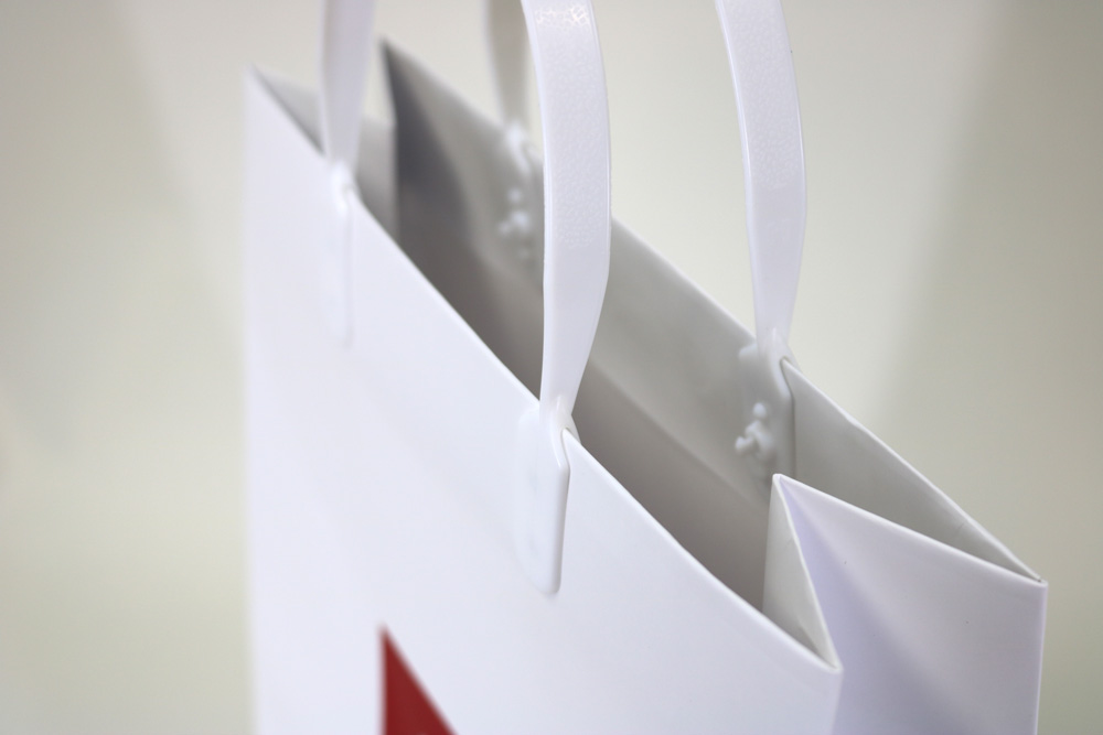 コート紙表面マットPP加工､シルク印刷2色のセミオーダー紙袋の入れ口画像