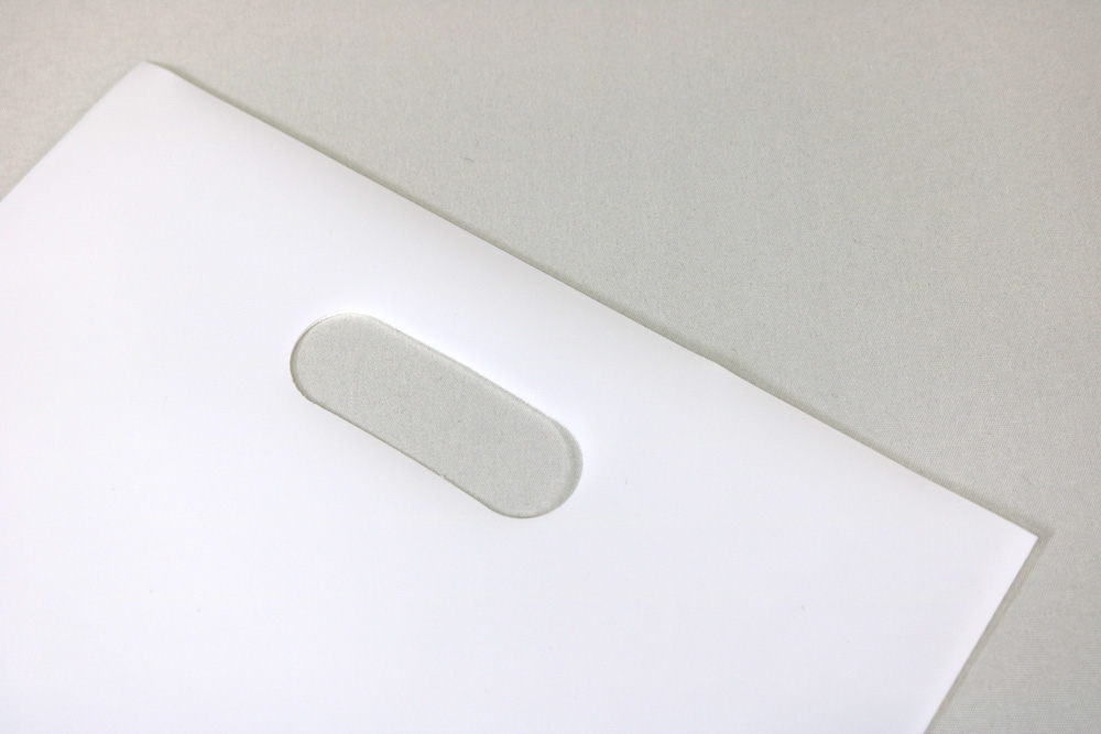 LDPE+OP 0.08㎜厚のUVオフセット印刷片面１色の小判穴抜きポリ袋の入れ口画像
