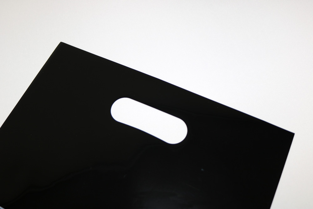 LDPE+OPP 0.08㎜厚のUVオフセット印刷片面２色の小判穴抜きポリ袋の入れ口画像